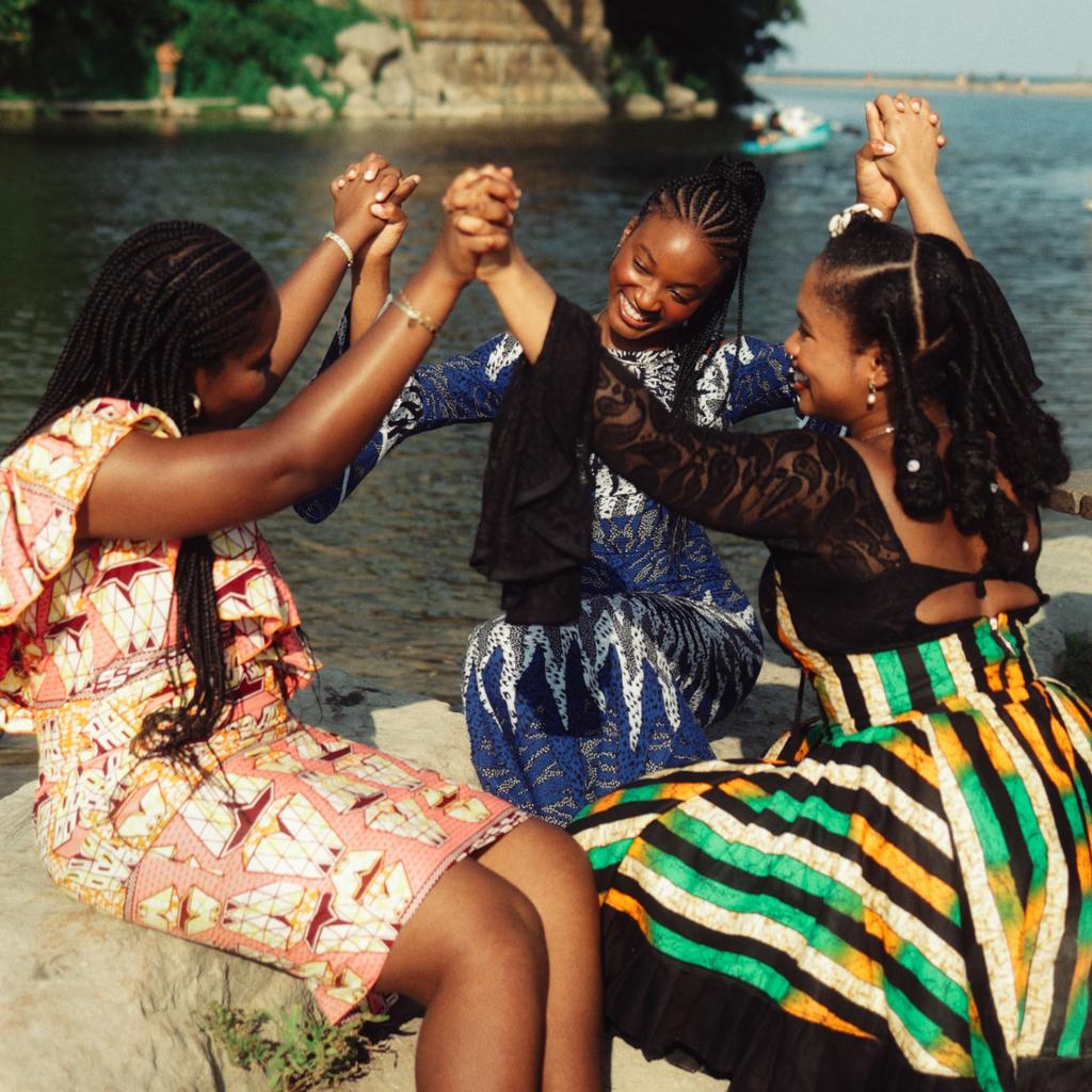 Friends celebrating together by the river