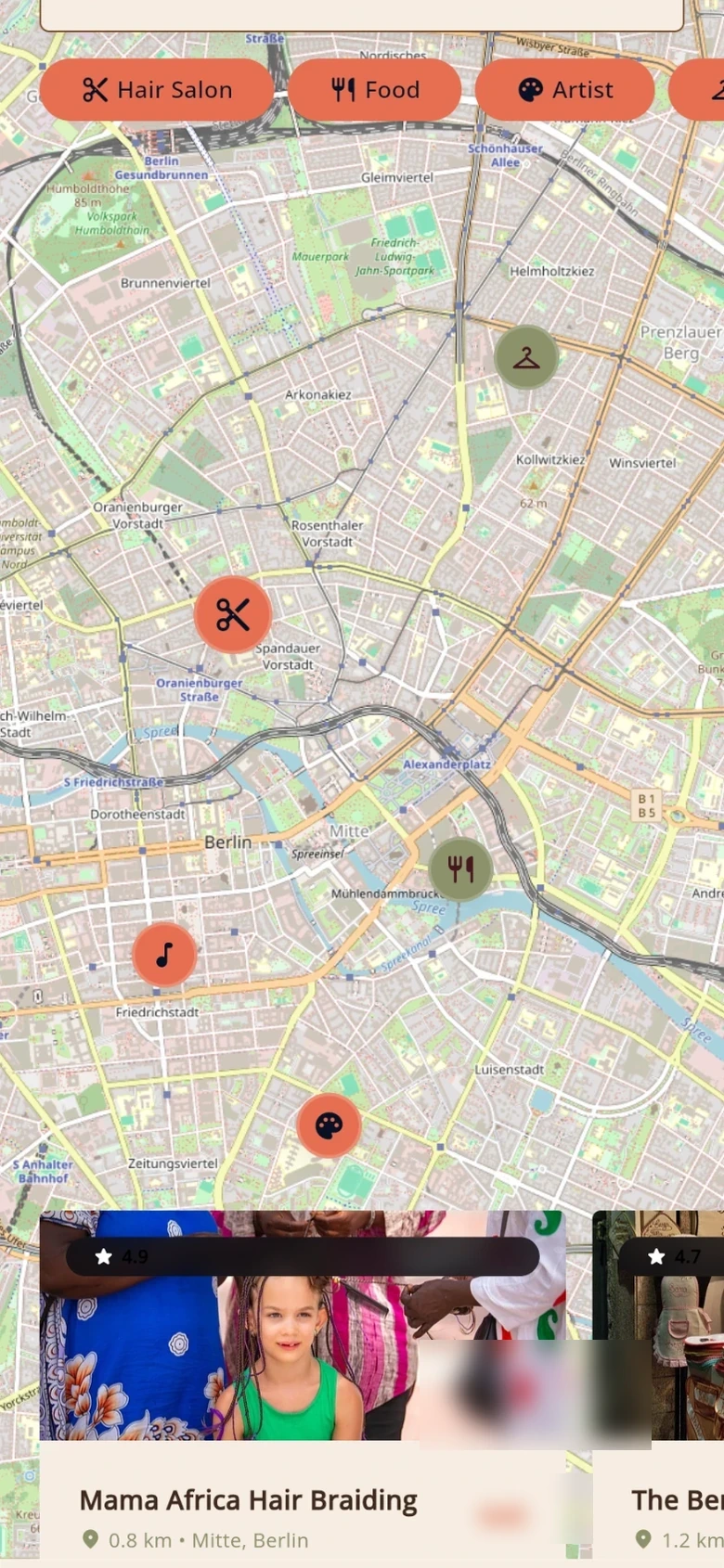 Bíneva app map showing hair salon, food and artist services nearby